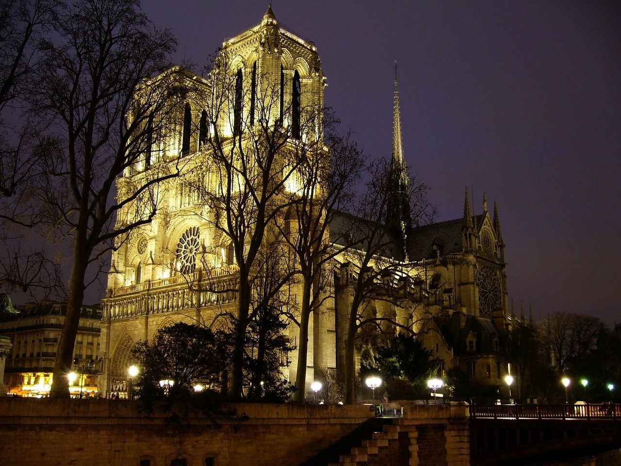Cathedral Notre Dame at night. Spire erected in 13th century. 
